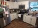 Modern kitchen with stainless steel appliances, granite countertops, and ample cabinet space at 290 Greentree Dr, Rock Hill, SC 29730