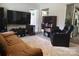 A cozy living room showcasing a comfortable couch, recliner, and entertainment setup at 290 Greentree Dr, Rock Hill, SC 29730