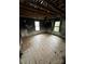 Bedroom featuring dual windows providing natural light and ample space for renovation at 306 E Arch St, Lancaster, SC 29720