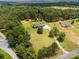 Spacious property with a well-maintained home, complemented by mature trees and expansive lawns at 330 Skyview Dr, Catawba, SC 29704
