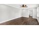 Light-filled bedroom featuring wood-look floors and a ceiling fan, creating a comfortable atmosphere at 330 Skyview Dr, Catawba, SC 29704