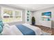 Cozy bedroom features a large window and built-in shelving with decorative vases at 330 Skyview Dr, Catawba, SC 29704