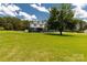 Charming two-story home with a lush green lawn, complemented by mature trees and a serene setting at 330 Skyview Dr, Catawba, SC 29704