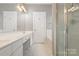 Bathroom featuring double sink vanity and glass enclosed shower at 3906 Balsam St, Indian Trail, NC 28079