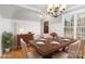 Formal dining room featuring elegant lighting, paneling, and a dining table at 3906 Balsam St, Indian Trail, NC 28079