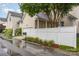 Home exterior with a picket fence and well maintained landscaping at 3906 Balsam St, Indian Trail, NC 28079