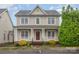 Lovely two-story home featuring a welcoming front porch and meticulously maintained landscaping at 3906 Balsam St, Indian Trail, NC 28079