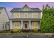 Charming two-story home with a welcoming front porch and well-maintained landscaping at 3906 Balsam St, Indian Trail, NC 28079