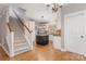 Bright kitchen featuring a center island, white cabinets, and stainless steel appliances at 3906 Balsam St, Indian Trail, NC 28079