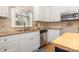 Kitchen featuring stainless steel appliances, stone countertops, and white cabinets at 3906 Balsam St, Indian Trail, NC 28079