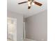 Ceiling fan is above the door that leads to the bathroom with double sink vanity at 3906 Balsam St, Indian Trail, NC 28079