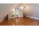 Open attic bedroom with unique ceiling fan, hardwood floor and lots of space at 416 E Park Ave, Charlotte, NC 28203