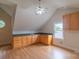 Spacious bonus room featuring ample storage space and hardwood floors at 416 E Park Ave, Charlotte, NC 28203