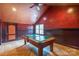 Spacious game room with pool table, custom paint, and unique flooring at 416 E Park Ave, Charlotte, NC 28203