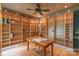 Home office featuring custom shelving and a wooden desk and chair at 416 E Park Ave, Charlotte, NC 28203