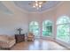 Comfortable living room with unique flooring, chairs, and ample natural light at 416 E Park Ave, Charlotte, NC 28203