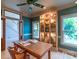Bright study with a lit display case, hardwood floors, and classic trim work at 416 E Park Ave, Charlotte, NC 28203