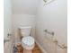 Standard toilet with hardwood floors at 416 E Park Ave, Charlotte, NC 28203