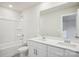 Bathroom with double sink vanity, white cabinets, and a shower-tub combination at 417 Bent Burr Crk, York, SC 29745
