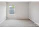 Bright bedroom with carpeted floors and a window for natural light at 417 Bent Burr Crk, York, SC 29745