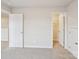 Bedroom area featuring two doors and new carpet at 417 Bent Burr Crk, York, SC 29745