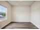 Neutral bedroom with a large window allowing for ample natural light and wood-look floors at 417 Bent Burr Crk, York, SC 29745