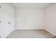 Bedroom featuring neutral walls, carpeted floors, and a closet with double doors at 417 Bent Burr Crk, York, SC 29745