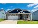 Beautiful single-Gathering home featuring stone accents, a two-car garage, and a well-manicured front yard at 417 Bent Burr Crk, York, SC 29745