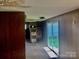 Living room featuring sliding glass doors for natural lighting and exterior views at 447 17Th St, Cramerton, NC 28032