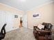 Bedroom featuring carpeted floors, and a comfortable sitting area with a leather chair at 5062 Gribble Ln, Lancaster, SC 29720