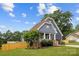 Charming two-story home with a manicured front yard, and a welcoming porch offering curb appeal at 516 King St, Waxhaw, NC 28173