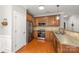 Well-equipped kitchen with stainless steel appliances, hardwood floors, and ample cabinet space at 516 King St, Waxhaw, NC 28173