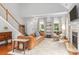 Inviting living room with hardwood floors, comfortable seating, and a cozy fireplace for a relaxing atmosphere at 516 King St, Waxhaw, NC 28173
