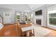 Cozy living room with a fireplace, comfortable seating, hardwood floors, and natural light at 516 King St, Waxhaw, NC 28173