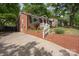 Beautiful brick home with a charming drive-up and landscaped yard at 534 W Kingston Ave, Charlotte, NC 28203