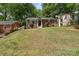 Charming brick home with a well-maintained front yard, offering great curb appeal at 534 W Kingston Ave, Charlotte, NC 28203
