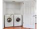 Laundry room equipped with a modern washer and dryer at 534 W Kingston Ave, Charlotte, NC 28203