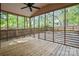 Relaxing screened porch featuring wooden floors and screens, offering a serene outdoor living space at 534 W Kingston Ave, Charlotte, NC 28203