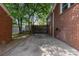 Side yard featuring a long driveway, offering plenty of parking and accessibility at 534 W Kingston Ave, Charlotte, NC 28203
