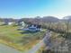 Aerial view of the property showcasing a large lot, mature trees, and country setting at 5413 Austin Rd # 4, Monroe, NC 28112