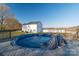 Backyard with a covered pool on a wood deck that has a safety fence around it at 5413 Austin Rd # 4, Monroe, NC 28112