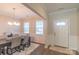 Elegant dining room featuring a dark wood table, upholstered chairs, and wainscoting at 5413 Austin Rd # 4, Monroe, NC 28112