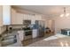 Modern kitchen with stainless steel appliances, granite countertops, and white cabinets at 5413 Austin Rd # 4, Monroe, NC 28112