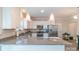 Well-appointed kitchen boasts stainless steel appliances, granite countertops, and white cabinetry at 5413 Austin Rd # 4, Monroe, NC 28112
