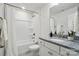 Bathroom with tub, shower combo, granite vanity, and white cabinets at 6416 Willow Pin Ln, Huntersville, NC 28078