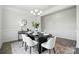 Cozy dining room with stylish decor, modern lighting, and comfortable seating at 6416 Willow Pin Ln, Huntersville, NC 28078