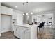 Bright kitchen featuring an island, stainless steel appliances, and open layout at 6416 Willow Pin Ln, Huntersville, NC 28078