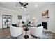 Spacious living room featuring modern decor, a fireplace, and comfortable seating at 6416 Willow Pin Ln, Huntersville, NC 28078