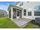 Rear elevation featuring a screened in back porch at 6416 Willow Pin Ln, Huntersville, NC 28078