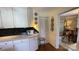 Kitchen featuring white cabinets, granite countertops, and decorative plates on the wall at 700 Valleyview Dr # 1, Albemarle, NC 28001